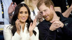 Meghan Markle giacca bianca e Harry